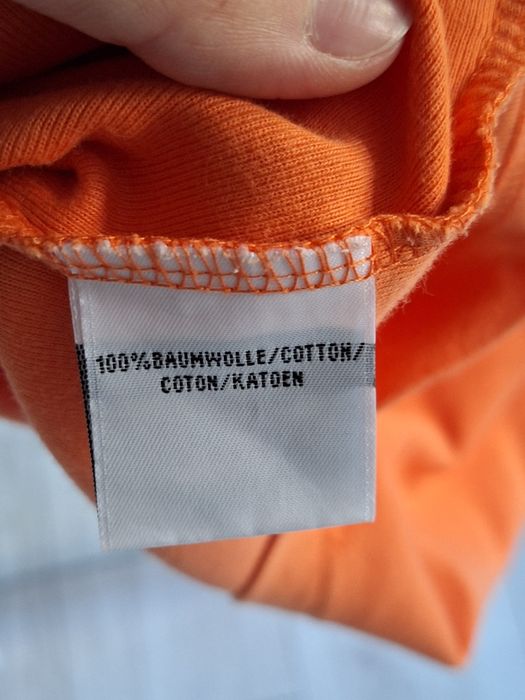 bawełniana pomarańczowa koszulka polo bez rękawków z kołnierzykiem