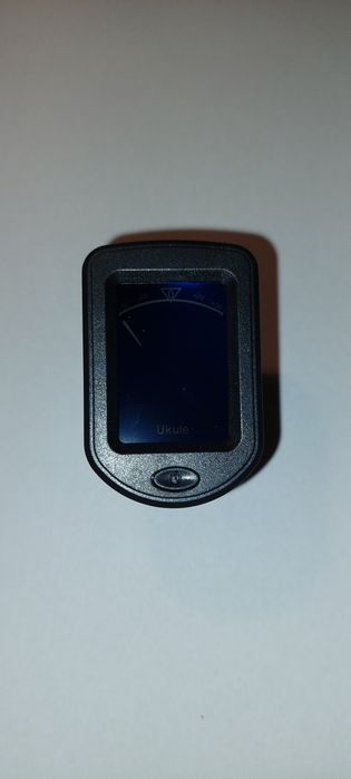 Tuner do strojenia gitary, ukulele i innych. Nowy