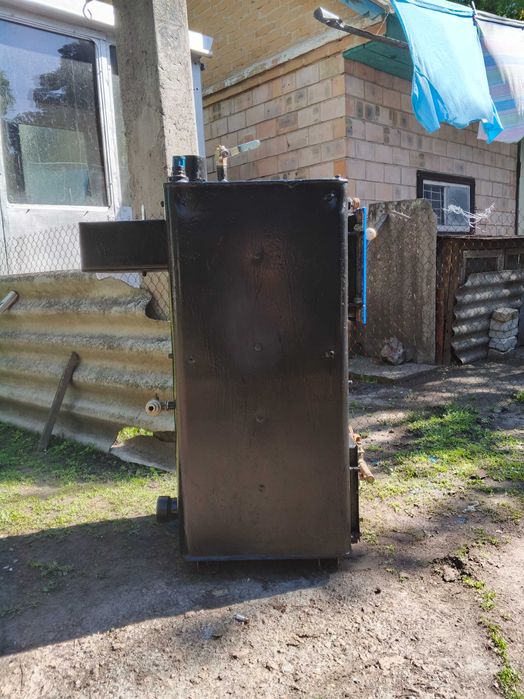 Продам котел Газовий, з можливістю опалення дровами