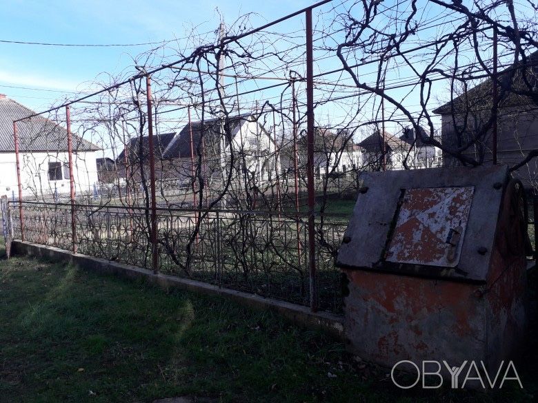 Будинок та земельна ділянка