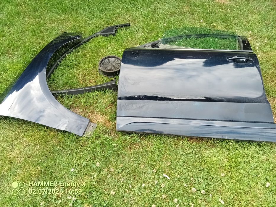 Drzwi Audi Q5  lewe błotnik