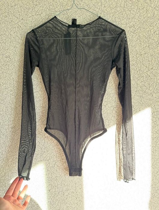 Чорне боді в сітку