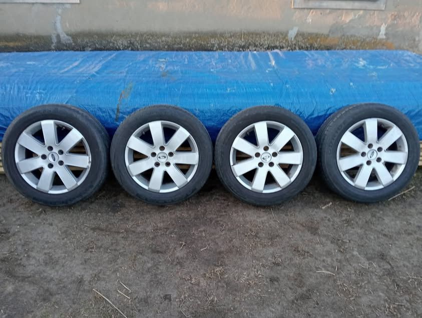 Felgi aluminiowe z oponami letnimi 16 cali ford