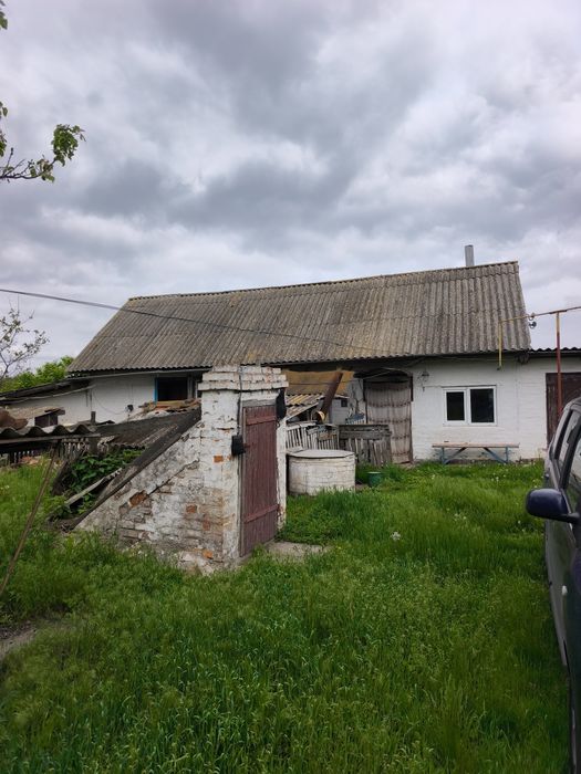 Продам приватизовоний будинок з приватизованою землею 45 соток.