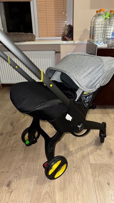 Коляска автокрісло