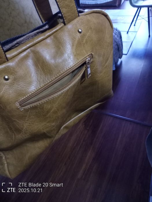 Продам сумку коричневого кольору