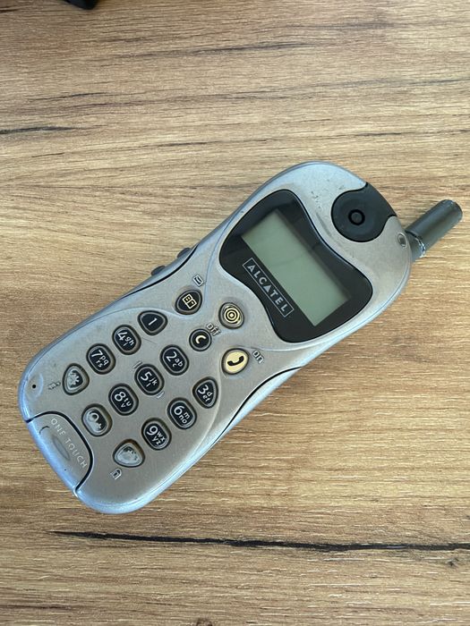 Telefon Alcatel One Touch + ładowarka