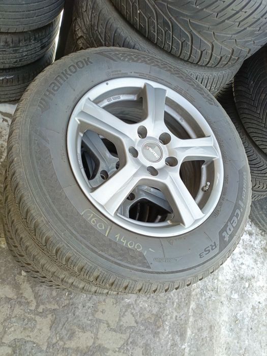 Koła aluminiowe zimowe Nissan Qashqai Dacia duster 215/65/16c Hankook