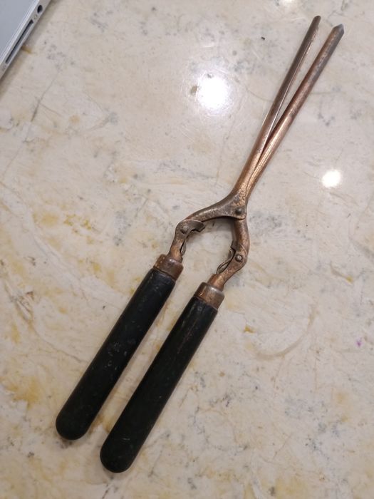 Enrolador de bigodes antigo XIX