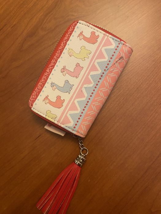 Porta moedas Nici. Da tambem para guardar cartoes