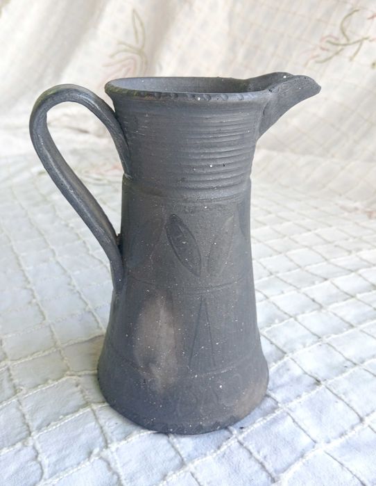Leiteira de barro negro