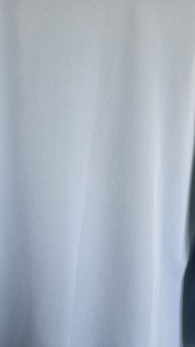 Błękitna bluzka 44 asymetria z kółkiem