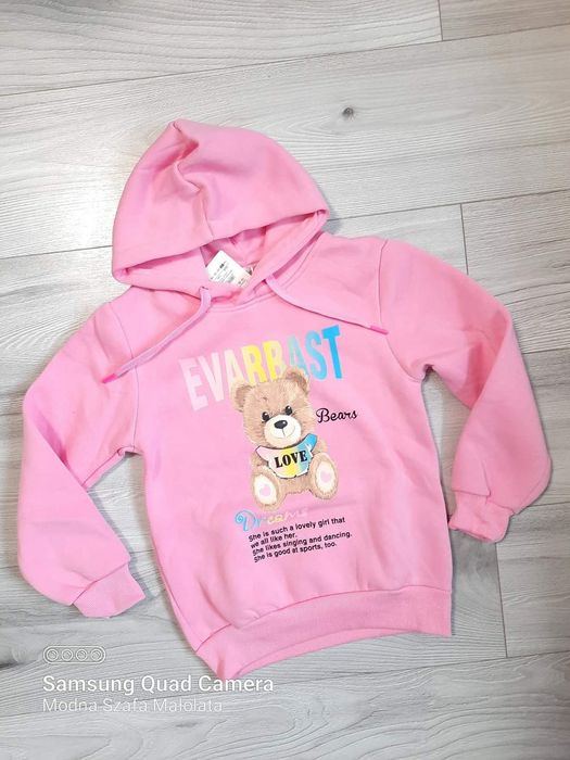 Bluza ocieplana z tym roz.140 nowa