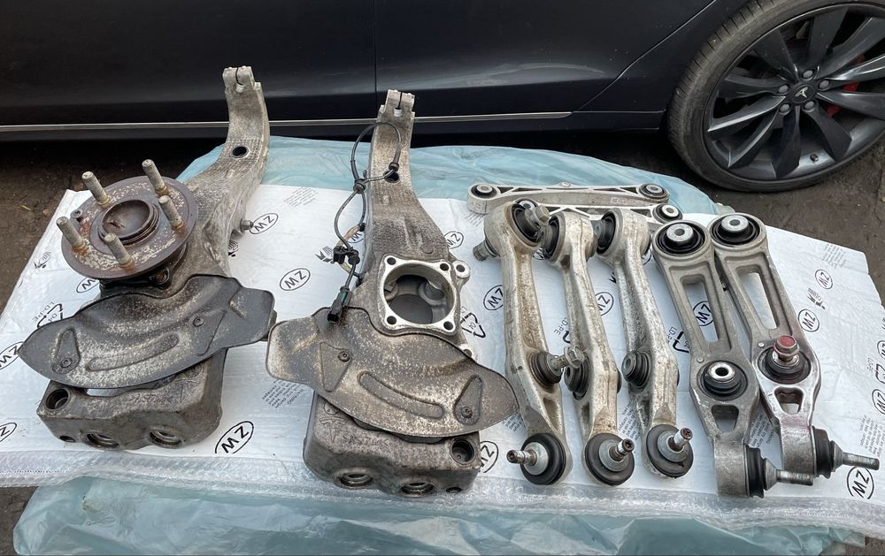 Ричаги,цапфи,колодки датчики ABS перед/зад Tesla model S