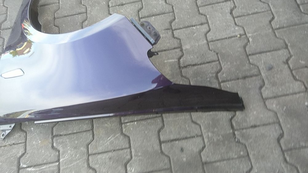 ) Lancia Ypsilon błotnik przedni lewy