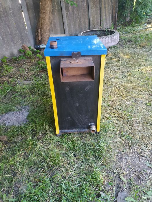 Продам котел твердопаливний