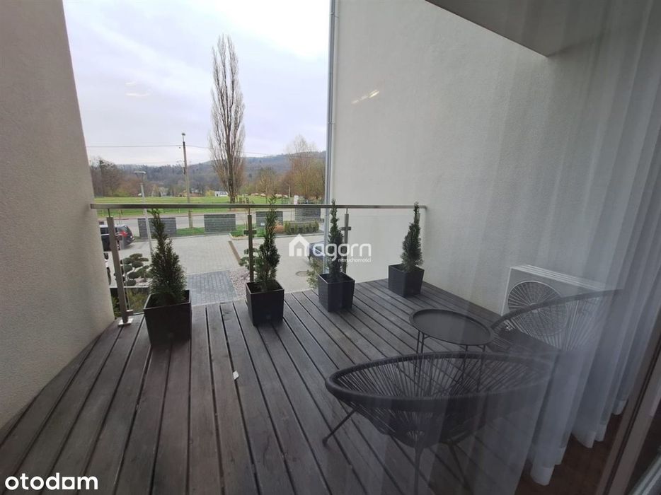 Apartamenty pod Dębowcem. Miejsce postojowe,