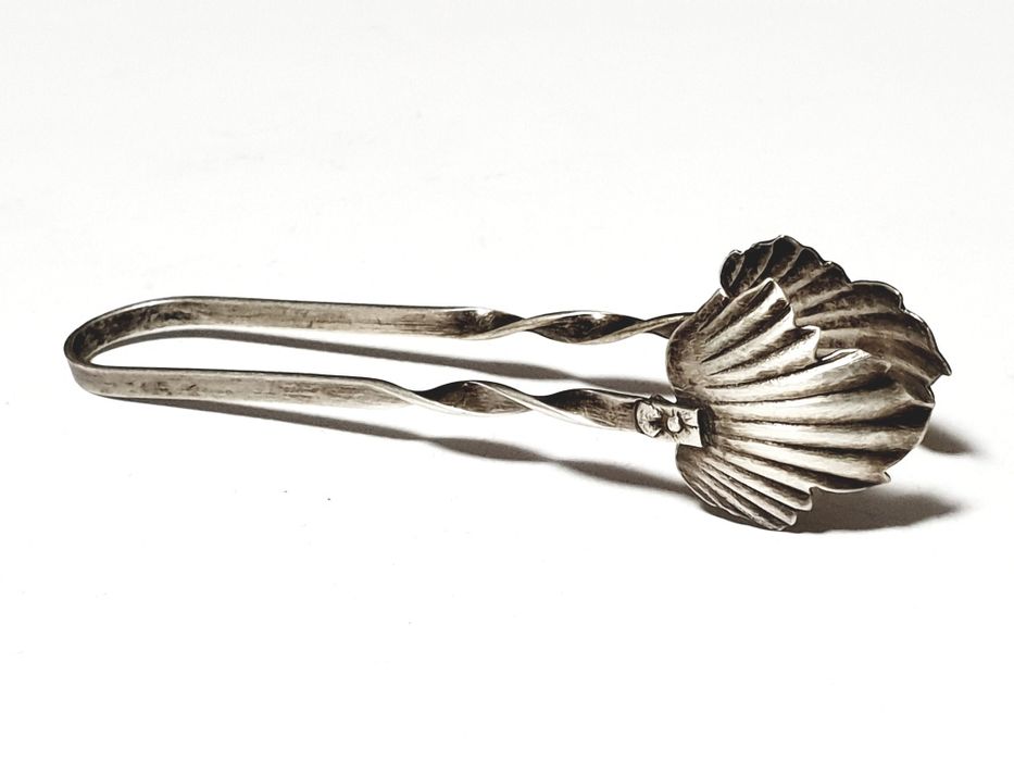 Antiga pinça para açúcar em pedra em prata contrastada