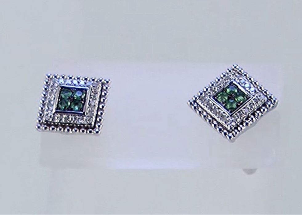 Прекрасные золотые серьги с бриллиантами и изумрудами