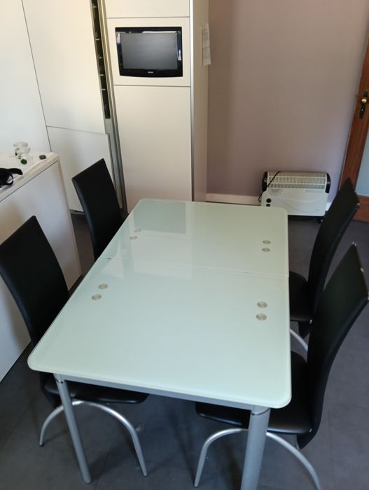 Mesa de jantar em vidro