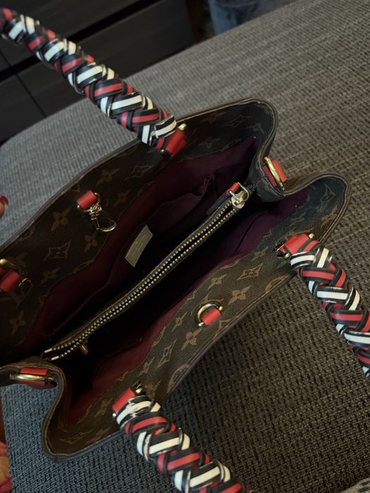 Mala Louis Vuitton com muitos detalhes