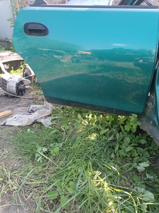 Двері Mazda 323 BA
