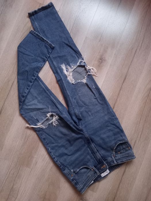 ASpodnie jeans Denim Sinsay roz 42 XL z rozdarciami