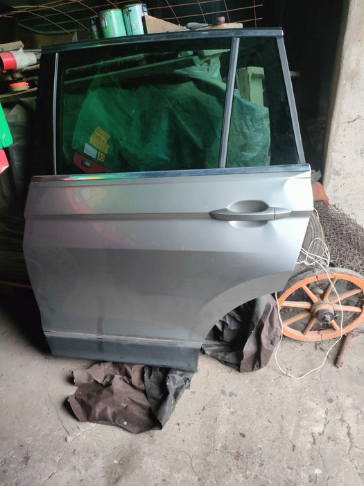 Drzwi lewy tył VW Tiguan kolor  LB7W