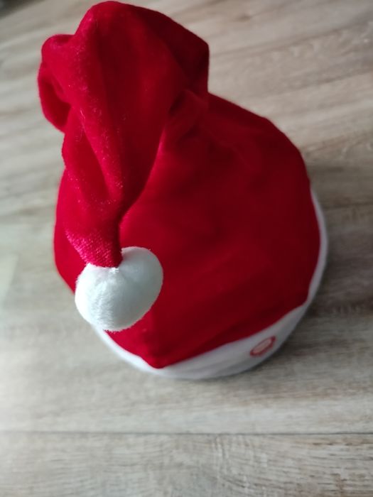 Grająca i tańcząca czapka mikołaja