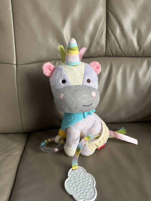 Skip Hop Сенсорна підвіска Єдиноріг з прорізувачем на коляску