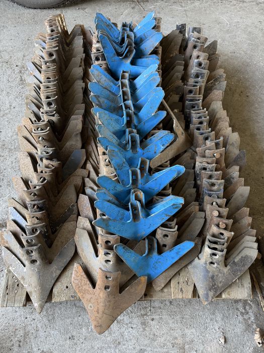 Лапи культиватора стрілки