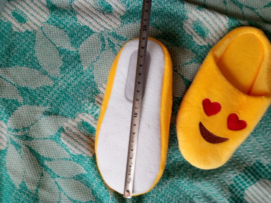 Нові дитячі тапочки