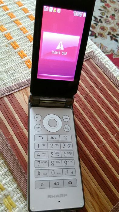 2Telefon Sharp białe kruki  !!!