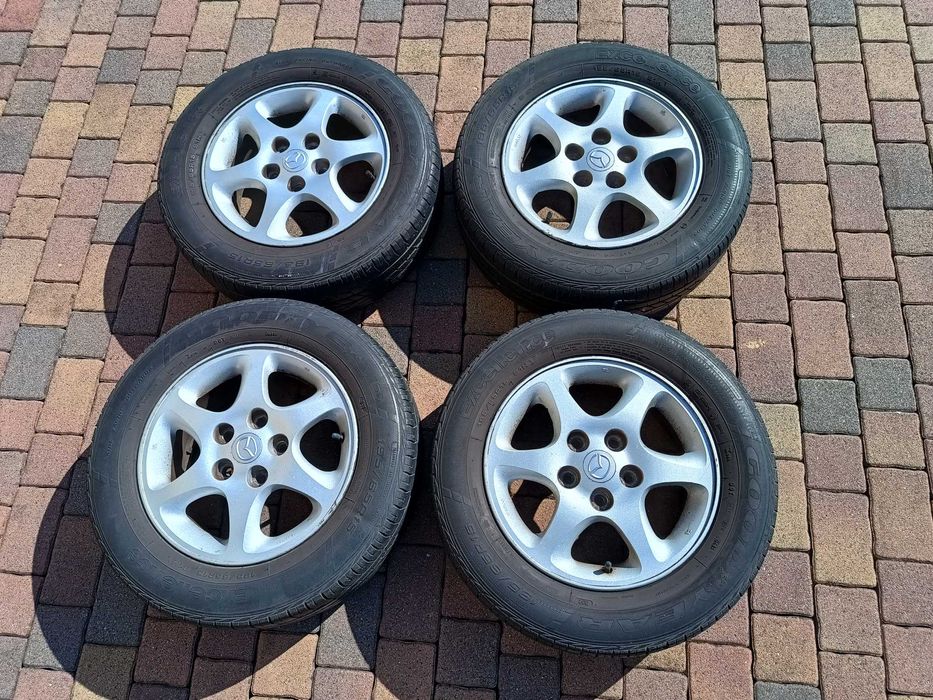 Alufelgi ENKEI 15 5x114.3 MAZDA 3 6 626 Premacy HYUNDAI i30 KIA Ceed MITSUBISHI Lancer TOYOTA Honda Suzuki | Opony 195/65R15 Goodyear | Felgi PROSTE