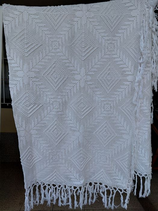 Colcha de renda feita à  mão
