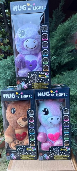 М'яка іграшка-нічник Hug to Light з функцією проєктора.