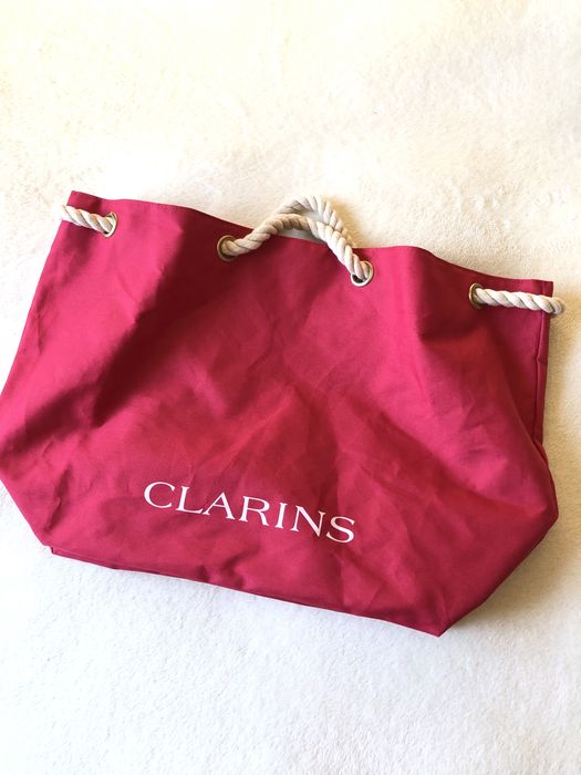 Пляжна сумка-тоут  CLARINS яскравого кольору