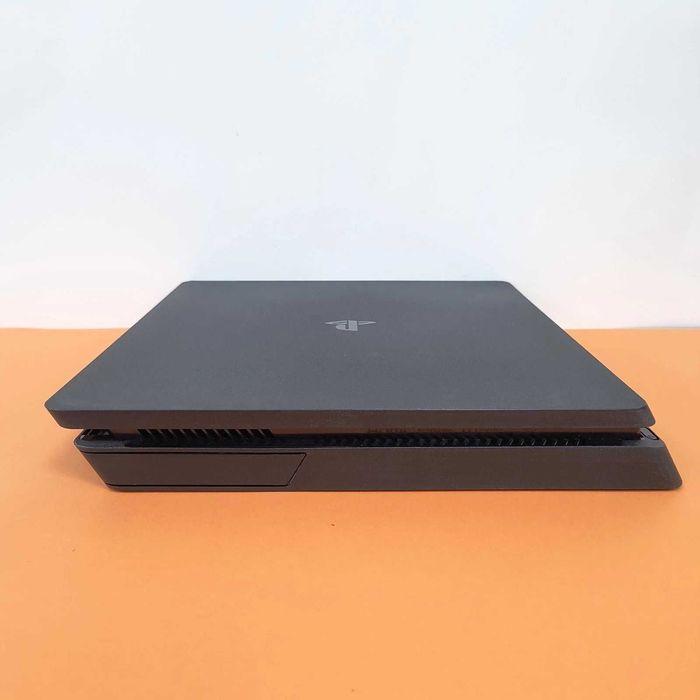 PS4 Slim 1TB Desbloqueada + GTA 5 + 3 Jogos + 1 Comando Novo + Cabo