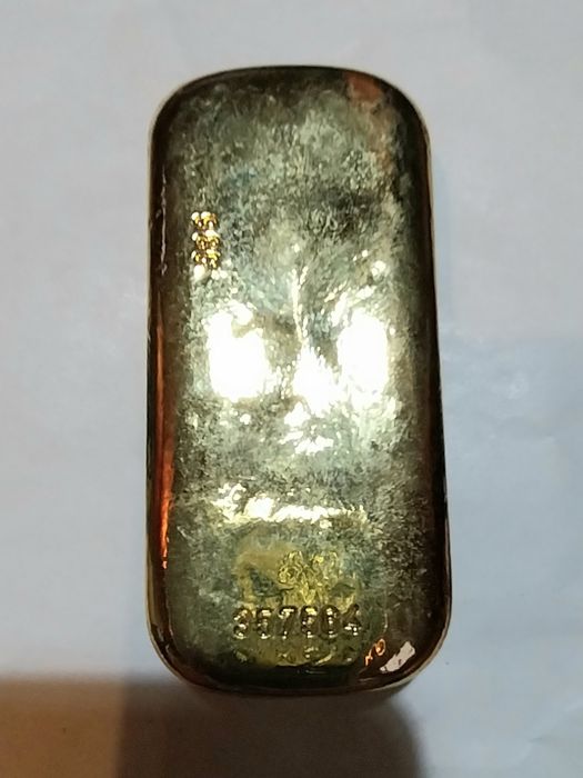 Abre cápsulas antigo em forma de barra de ouro