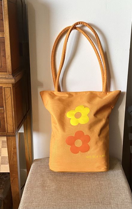 Saco Agatha Ruiz de la Prada impermeável e lavável.