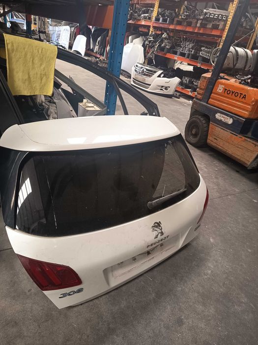 Tampa mala Peugeot 308 ano 2015