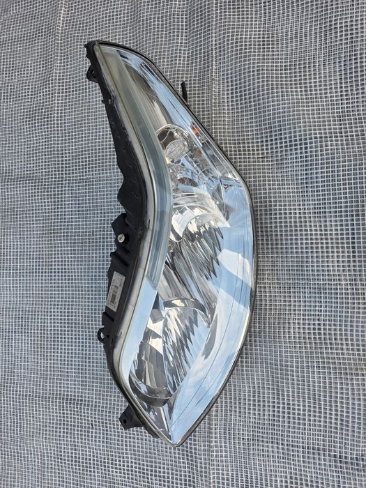 Citroen C4 lampa reflektor lewy przód Europa wysyłka oryginał