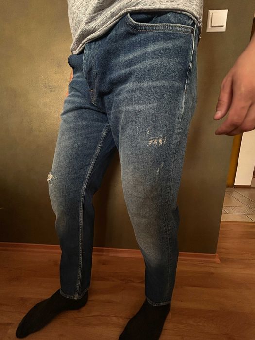 Męskie spodnie jeansowe 44 PULL&BEAR przecierane z dziurą niebieskie