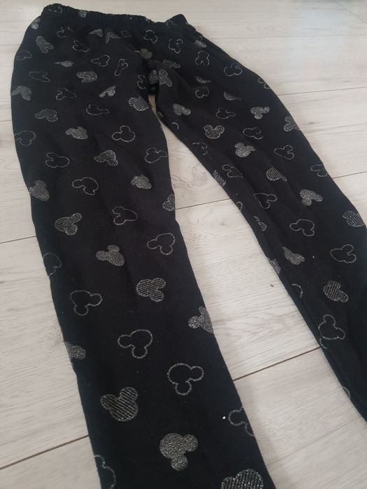 Spodnie leginsy  dziewczęce roz 158 czarne w kształty micky brokatowe