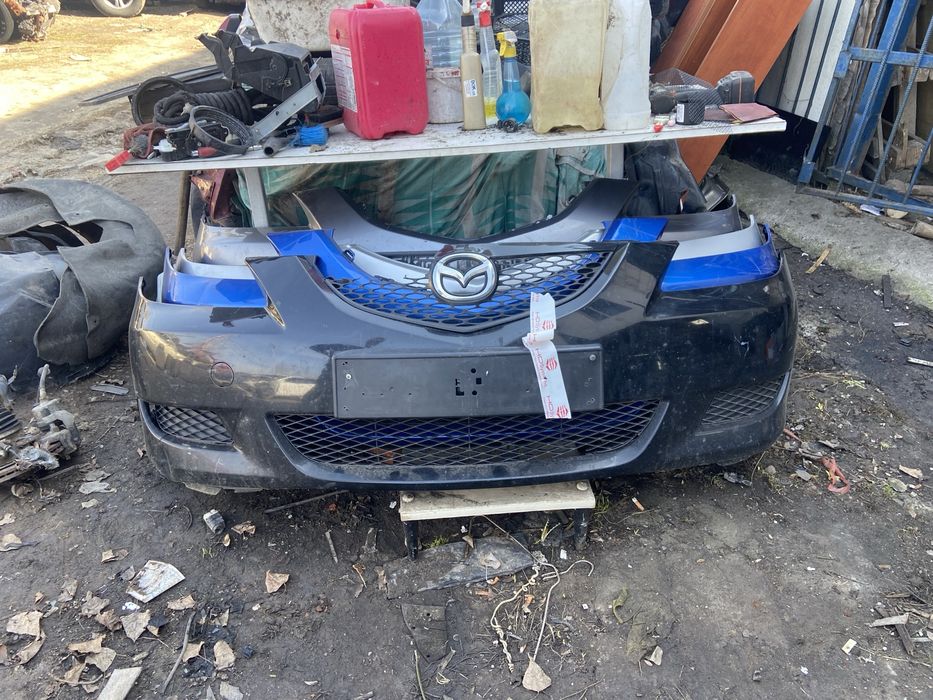 Передний бампер мазда 3бк телевизор уселитель капот