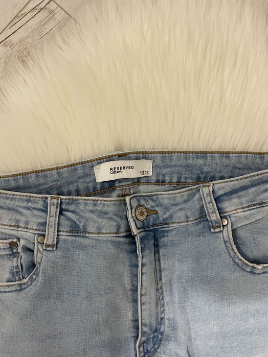 Niebieskie jeansy Reserved 40