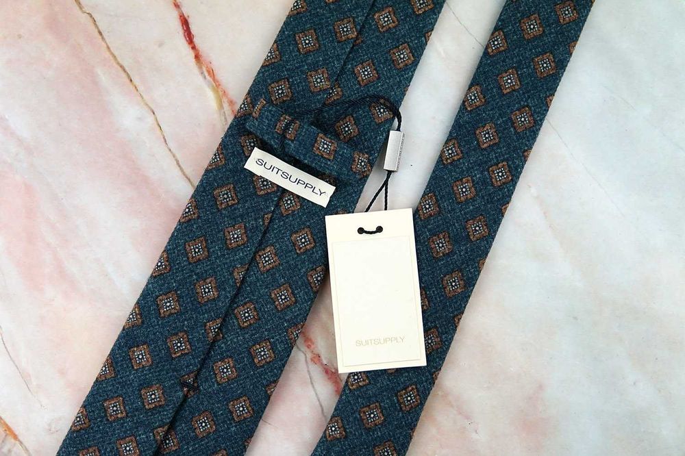 NOWY klasyczny wełniany krawat w ornamenty SuitSupply męski szeroki