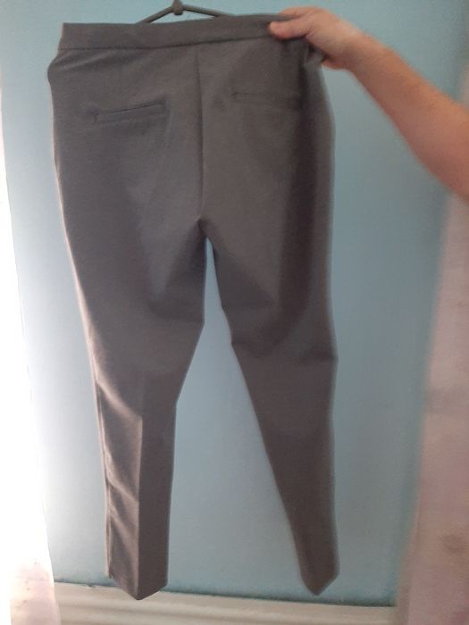 Продам жіночі сірі брюки 42