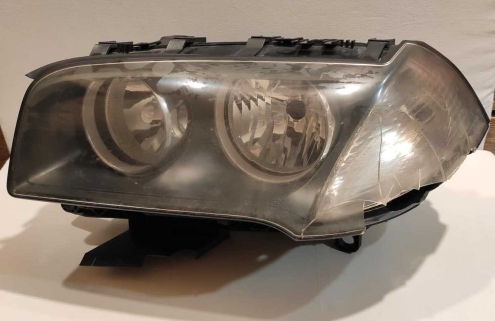 Lampa BMW X3 e83 Lift EU Uszkodzona Lewa z mocowaniem reflektora