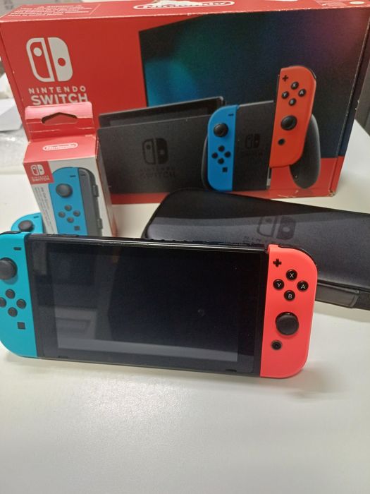 Nintendo + comando extra + bolsa